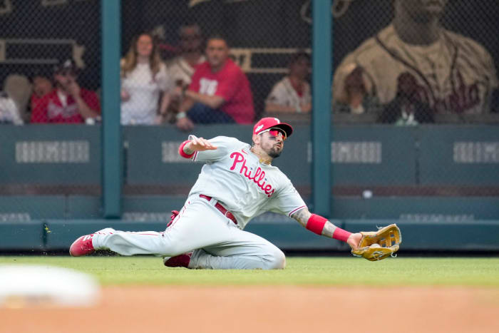 Phillies right fielder Nick Castellanos makes a brilliant sliding catch in the ninth inning against the Braves.